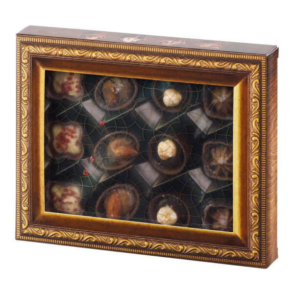 CHOCOBON. Pralinenschachtel mit gefüllten Pralinenbechern.