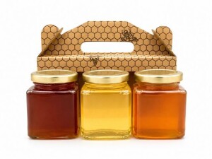 Geschenkset – HONEY TRIO in Kartonverpackung mit Waben- und Bienenmotiv - Reklamnepredmety