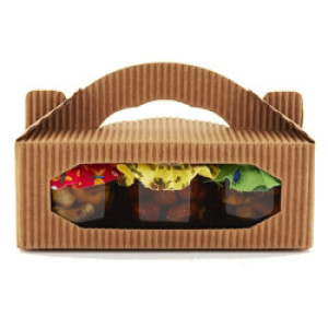 Sada orieškov v mede v kartóniku