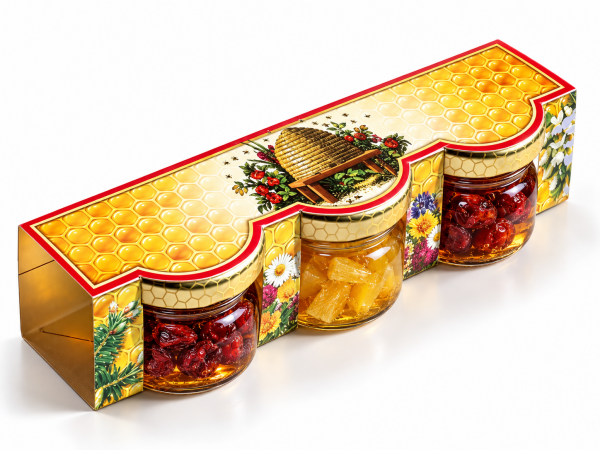 Set aus in Honig eingelegten Trockenfrüchten in einer bedruckten Pappschachtel
