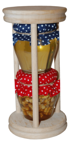 Satz Honig und Nüsse in Honig in einem Gestell - Reklamnepredmety