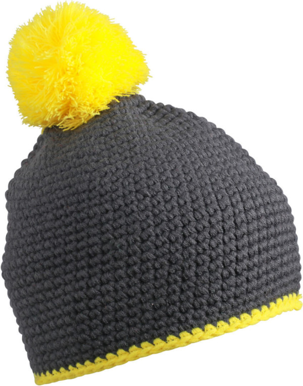 Häkelmütze mit Kontrastrand und Pompon